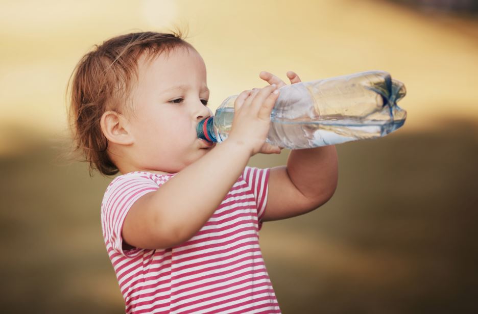 drink water in plastic bottle